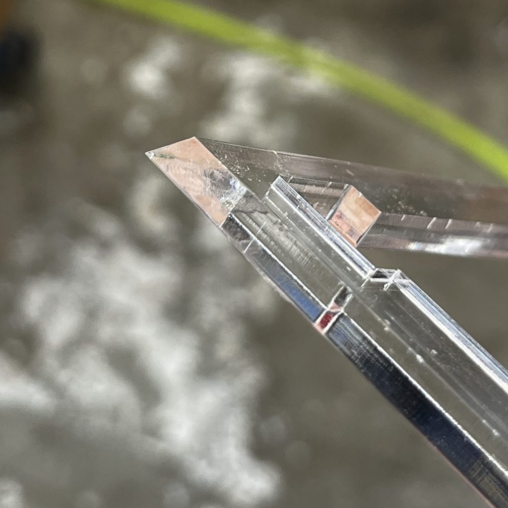 Clear acrylic with bevel on one side cut on a laser cutter